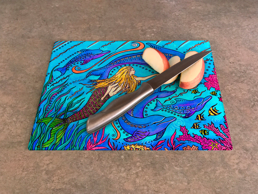 Swimming with Dolphins Cutting Board